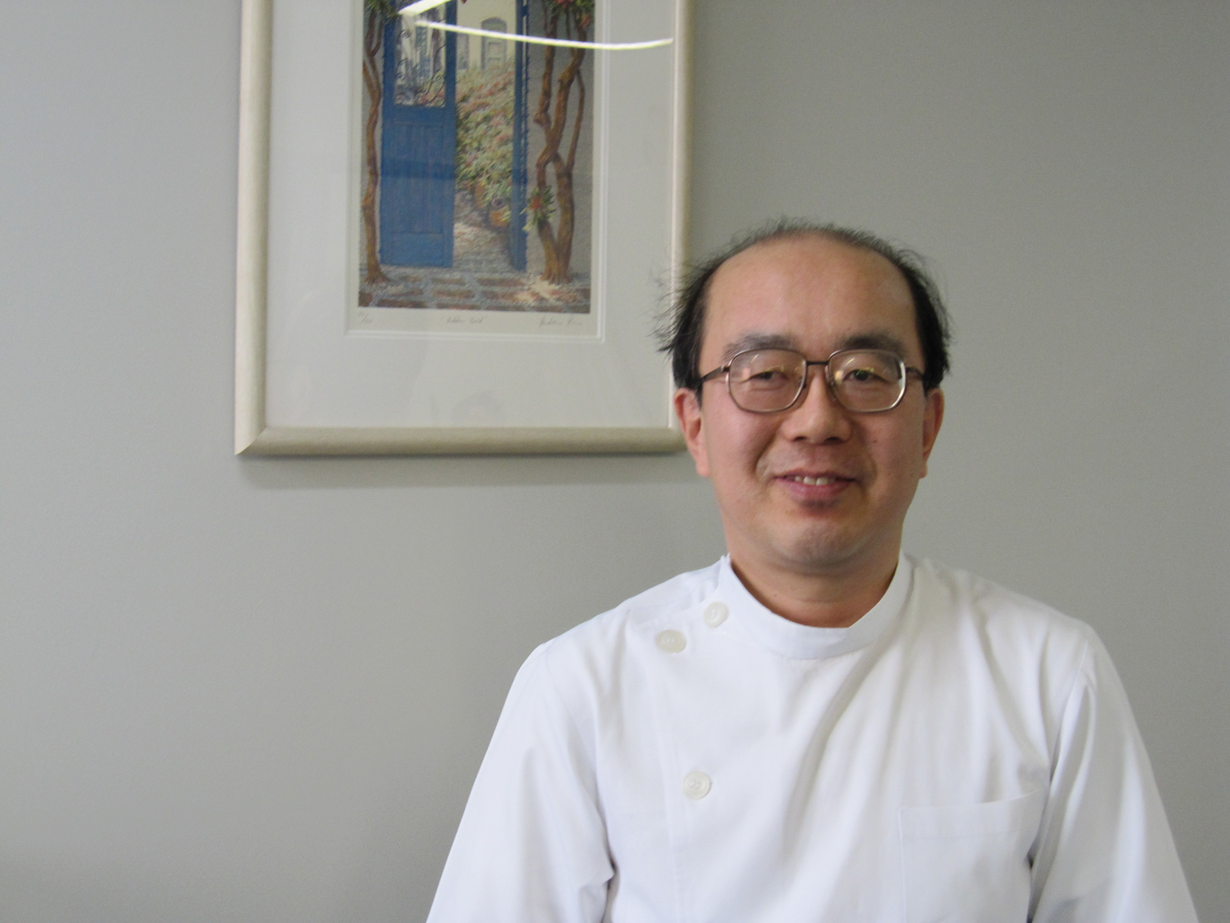 写真は、大石さんの顔写真です